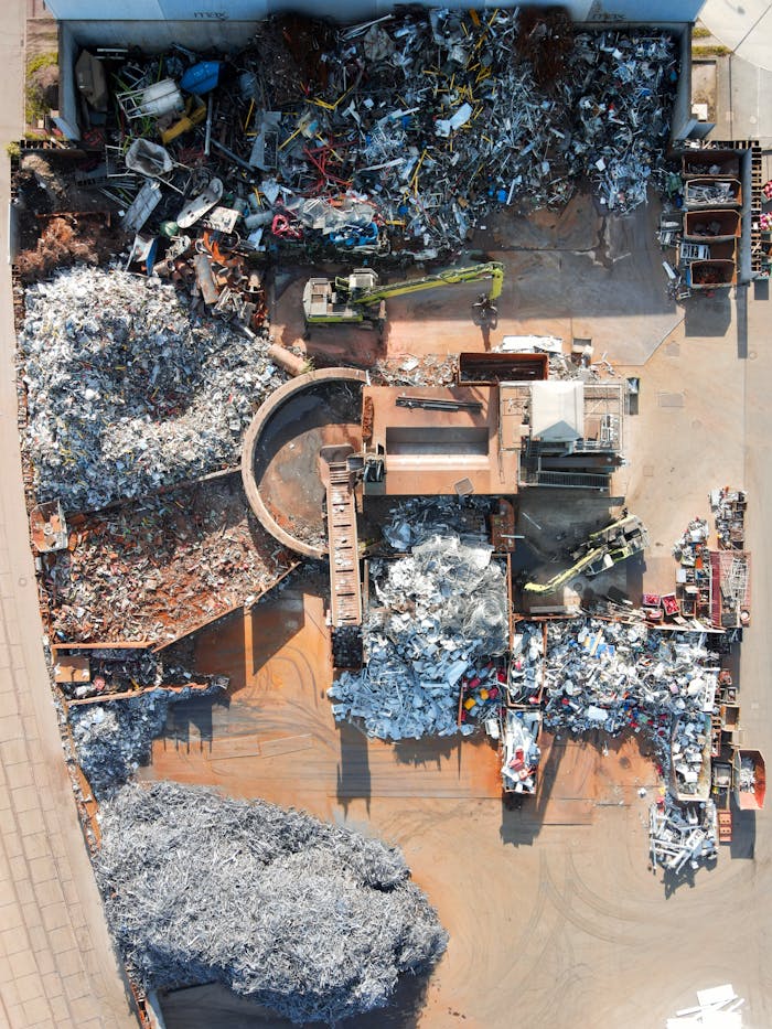 about-02 Aerial photo capturing a recycling facility in Regensburg, showcasing scrap and machinery.
